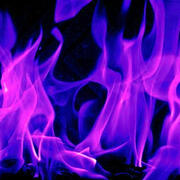 flames tinted purple on a black background. the edges are more indigo